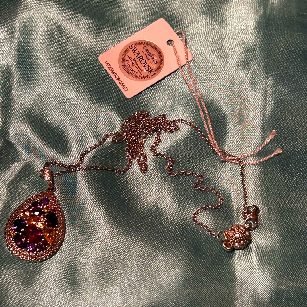 Swarovski neckless 21 inch. New with tag.  Magnetic clasp. Very feminine.